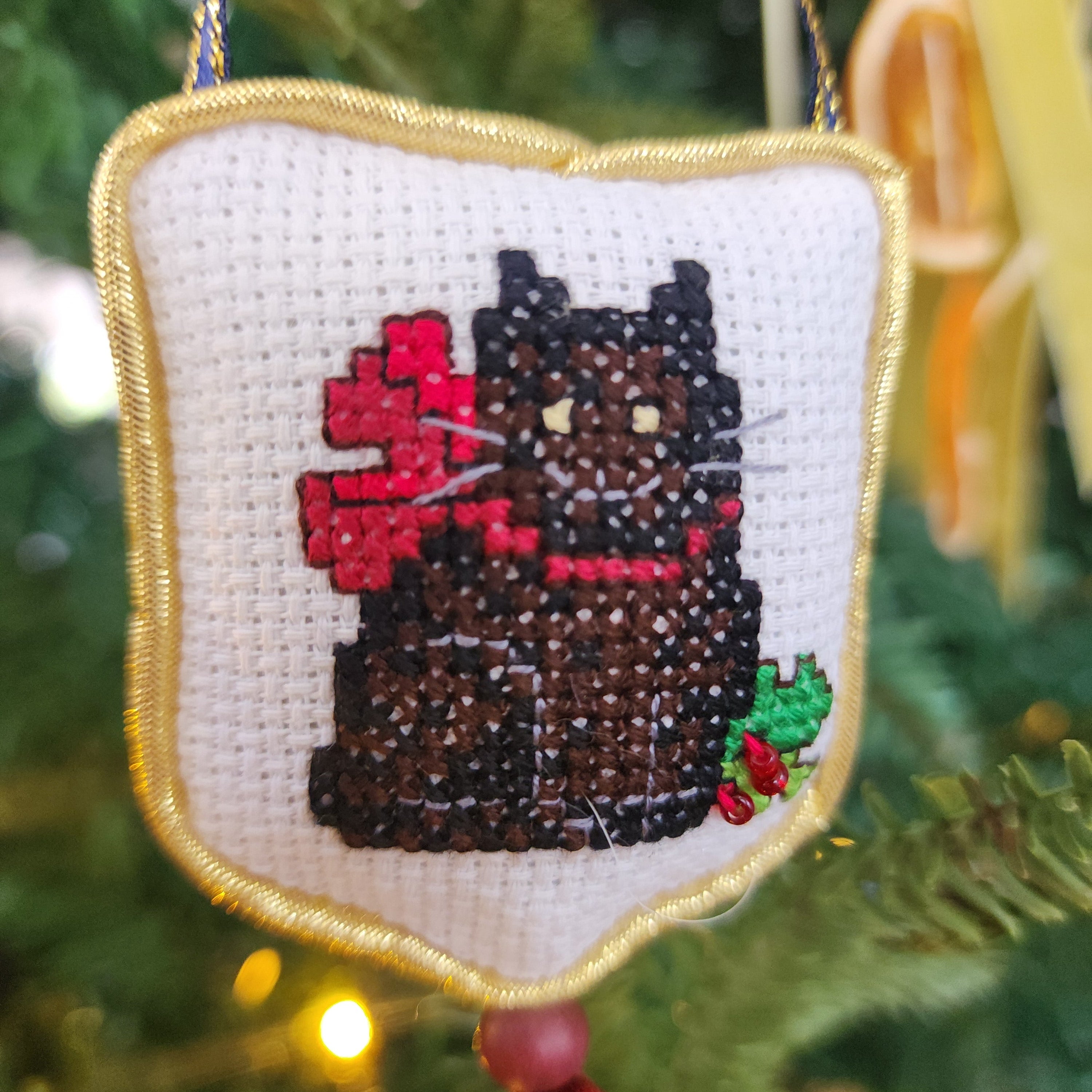 Hand stitched cat ornament for Christmas tree