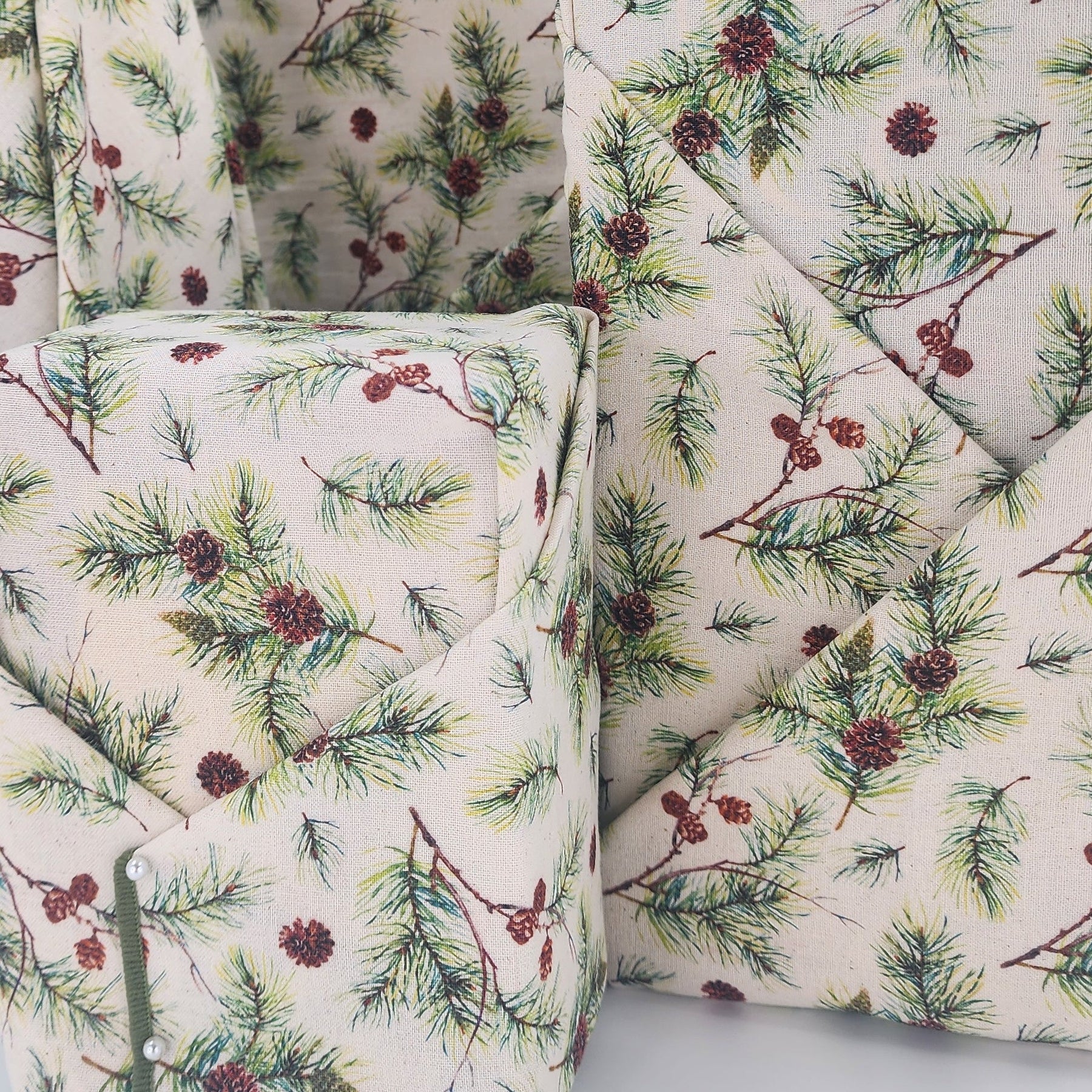 Furoshiki cotton gift wrap on natural cotton with green and borown pine boughs