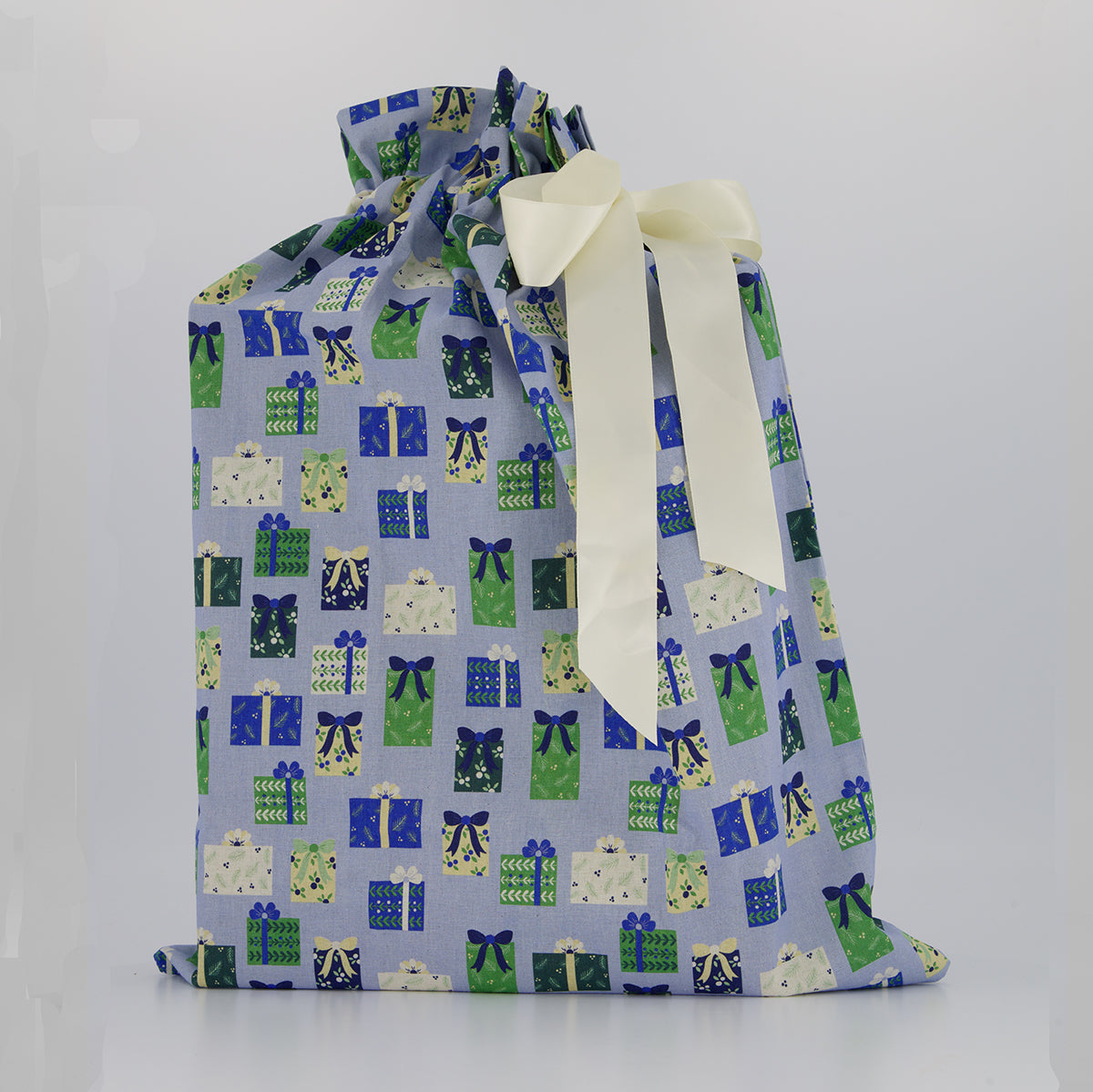 Large reusable gift bag — illustrated gift box print in soft blue, sage and cream — handmade in Afghanistan