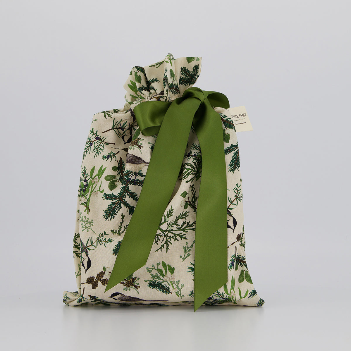 Medium reusable gift bag — pine and berry print in green, brown and cream — handmade in Afghanistan