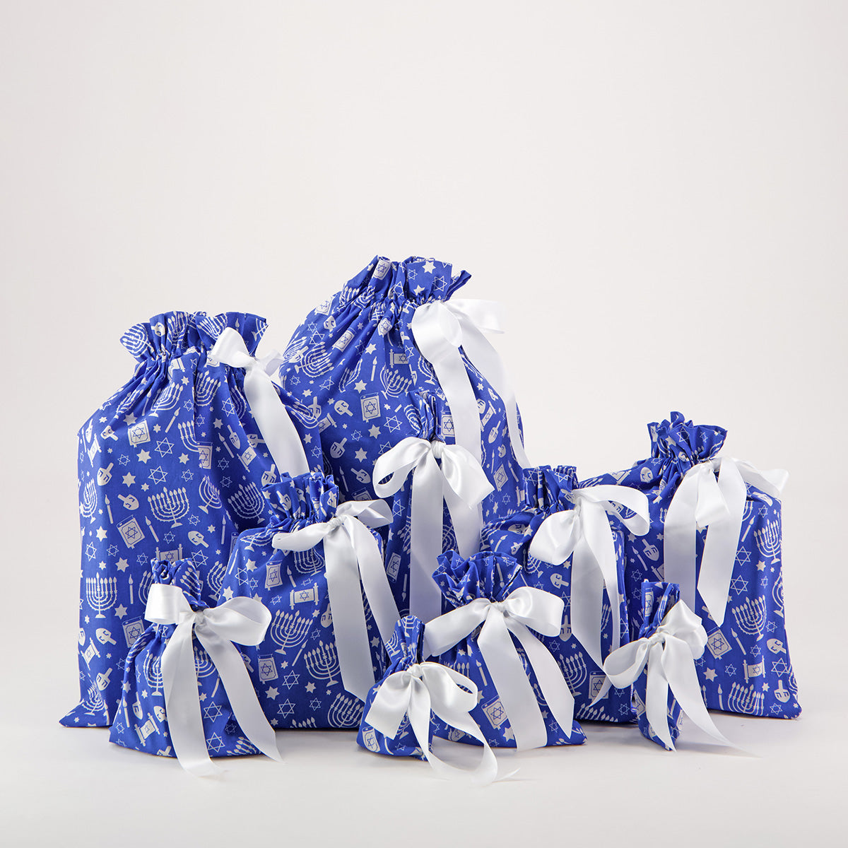 Hanukkah reusable gift bag set of 10 — menorah and Star of David print in white on cobalt blue — handmade in Afghanistan