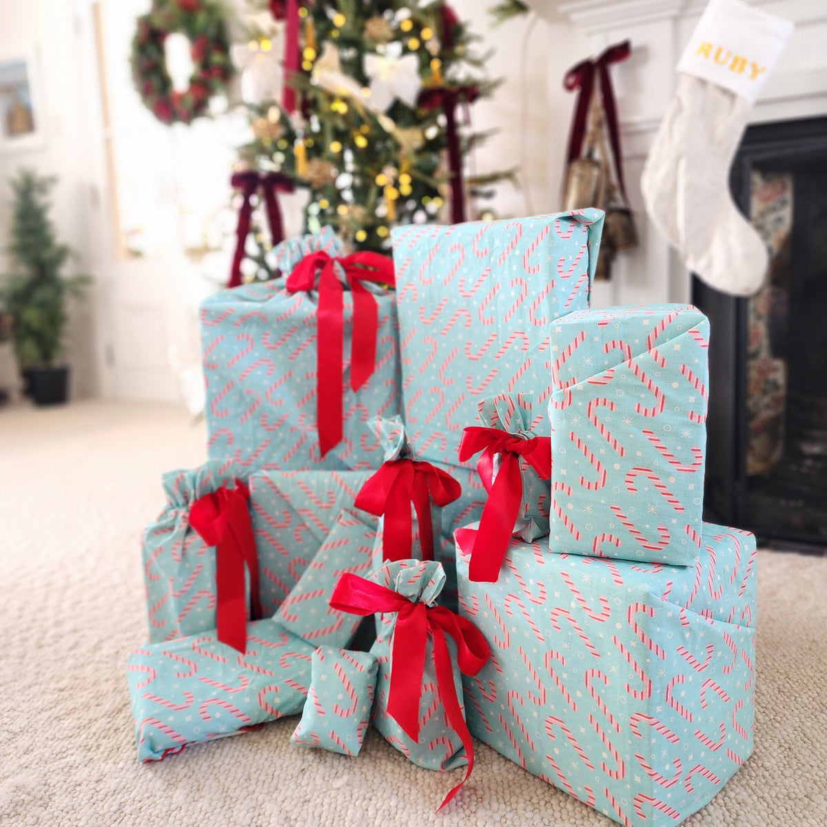 Feliz Navidad gifts wrapped in Dulces bags and furoshiki