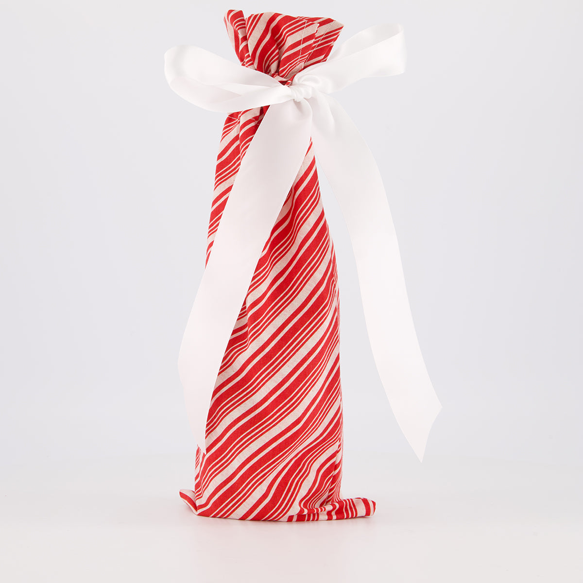 bottle reusable gift bag — bold candy cane stripe in red and white — handmade in Afghanistan