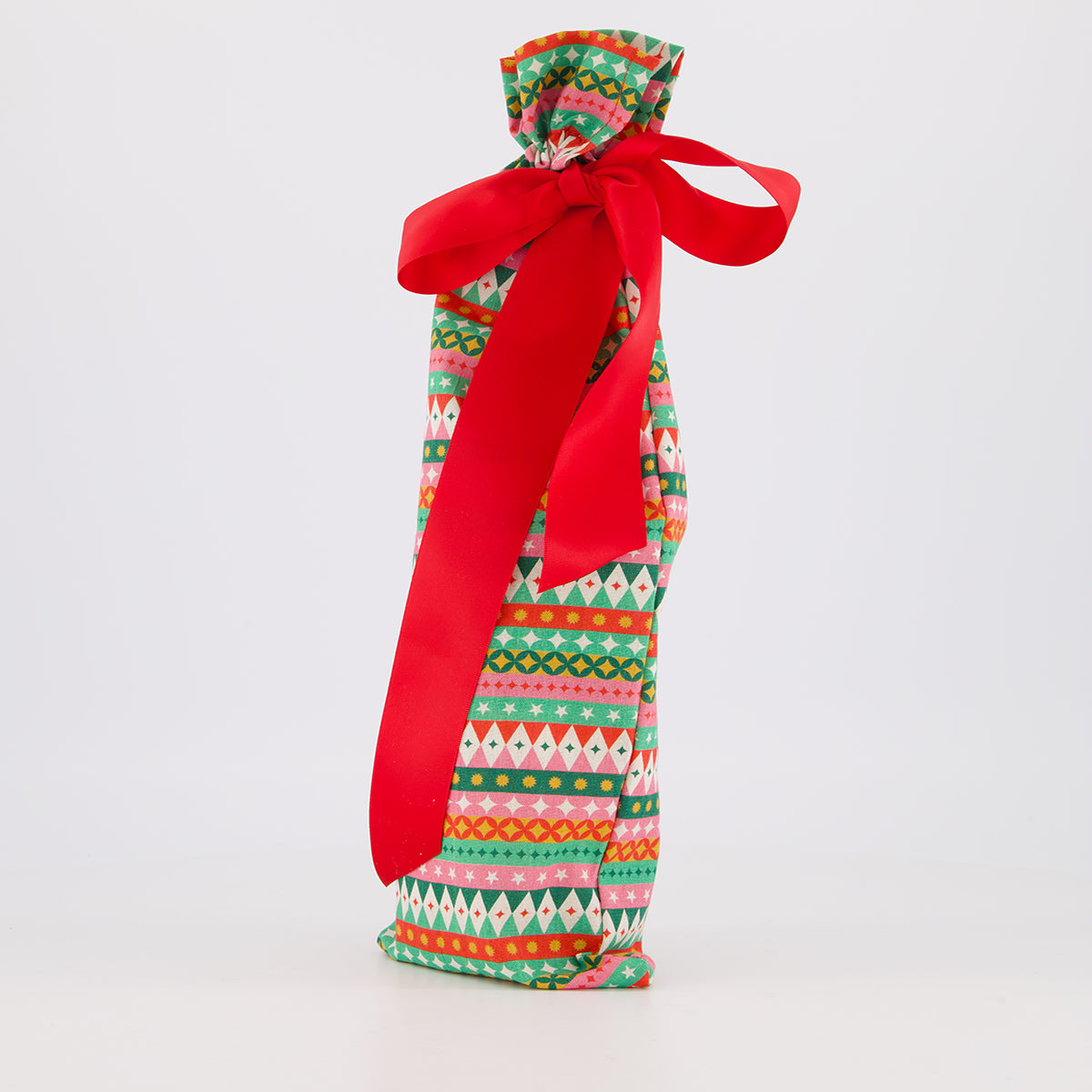 bottle reusable gift bag — vibrant fiesta print in red, pink, green and gold — handmade in Afghanistan