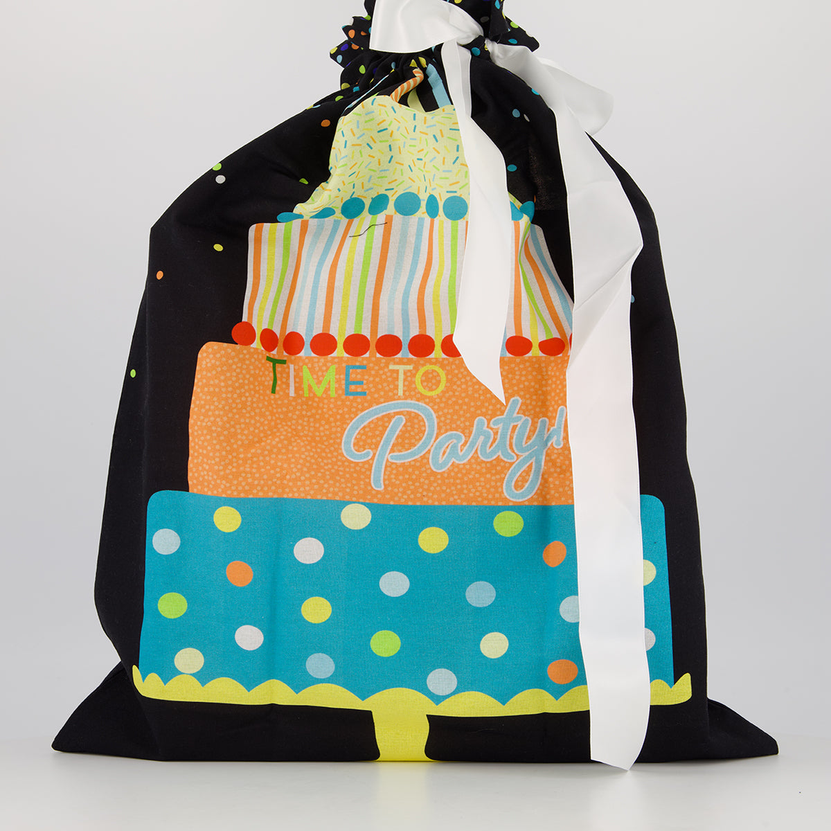 Large reusable gift bag — big birthday cake with candles on a dark background — handmade in Afghanistan