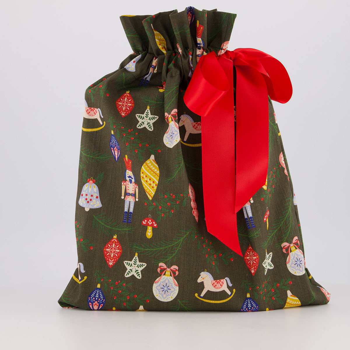 Medium reusable gift bag — bold folk print in green, red and navy — handmade in Afghanistan