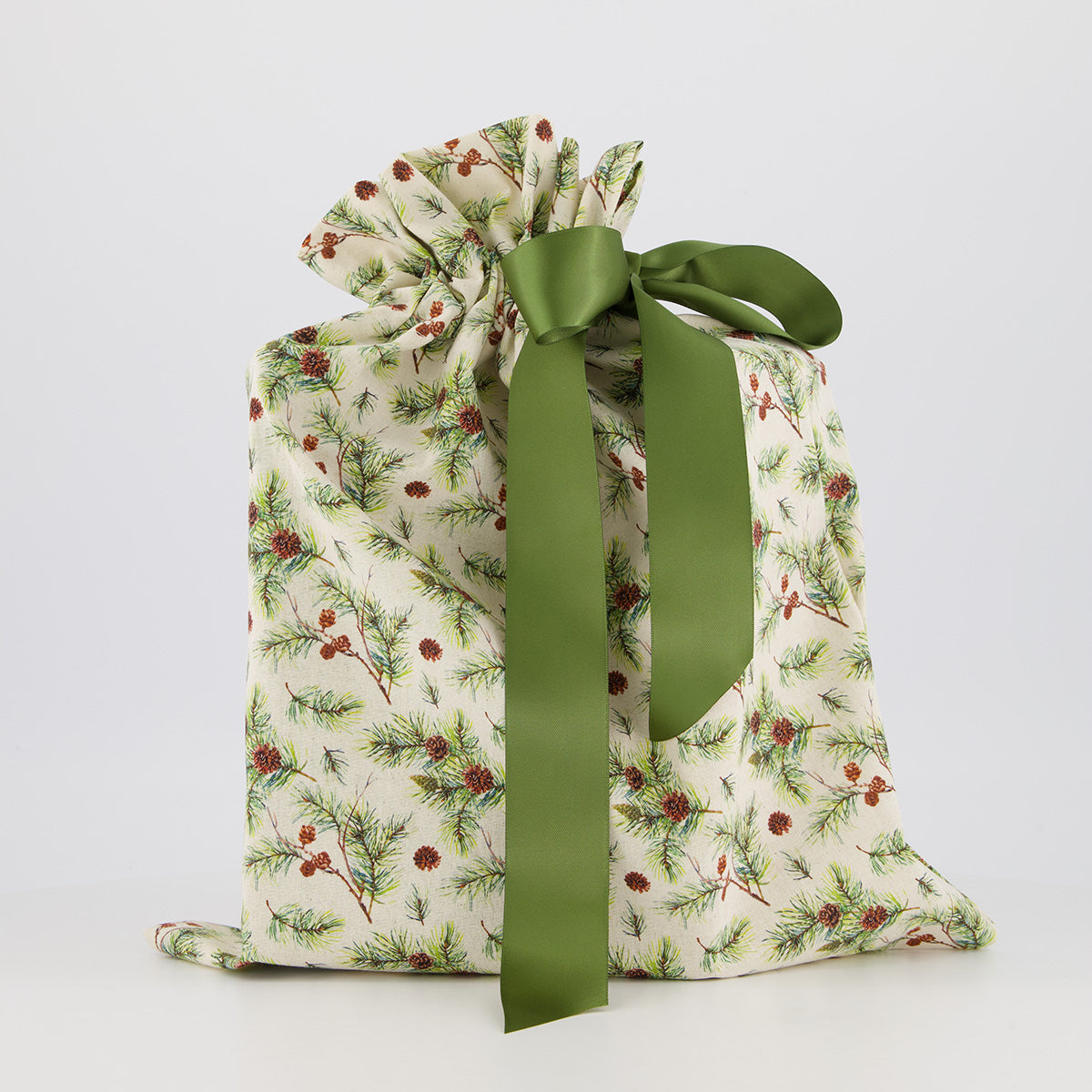 Medium reusable gift bag — subtle woodland botanical print in green and cream — handmade in Afghanistan