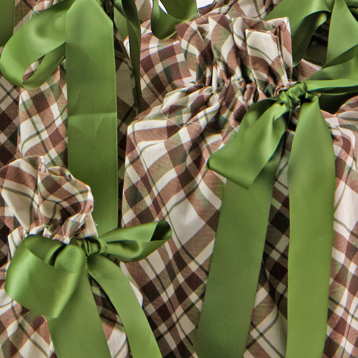 Nadarrach Tartan fabric close-up — classic tartan check in forest green, brown and cream
