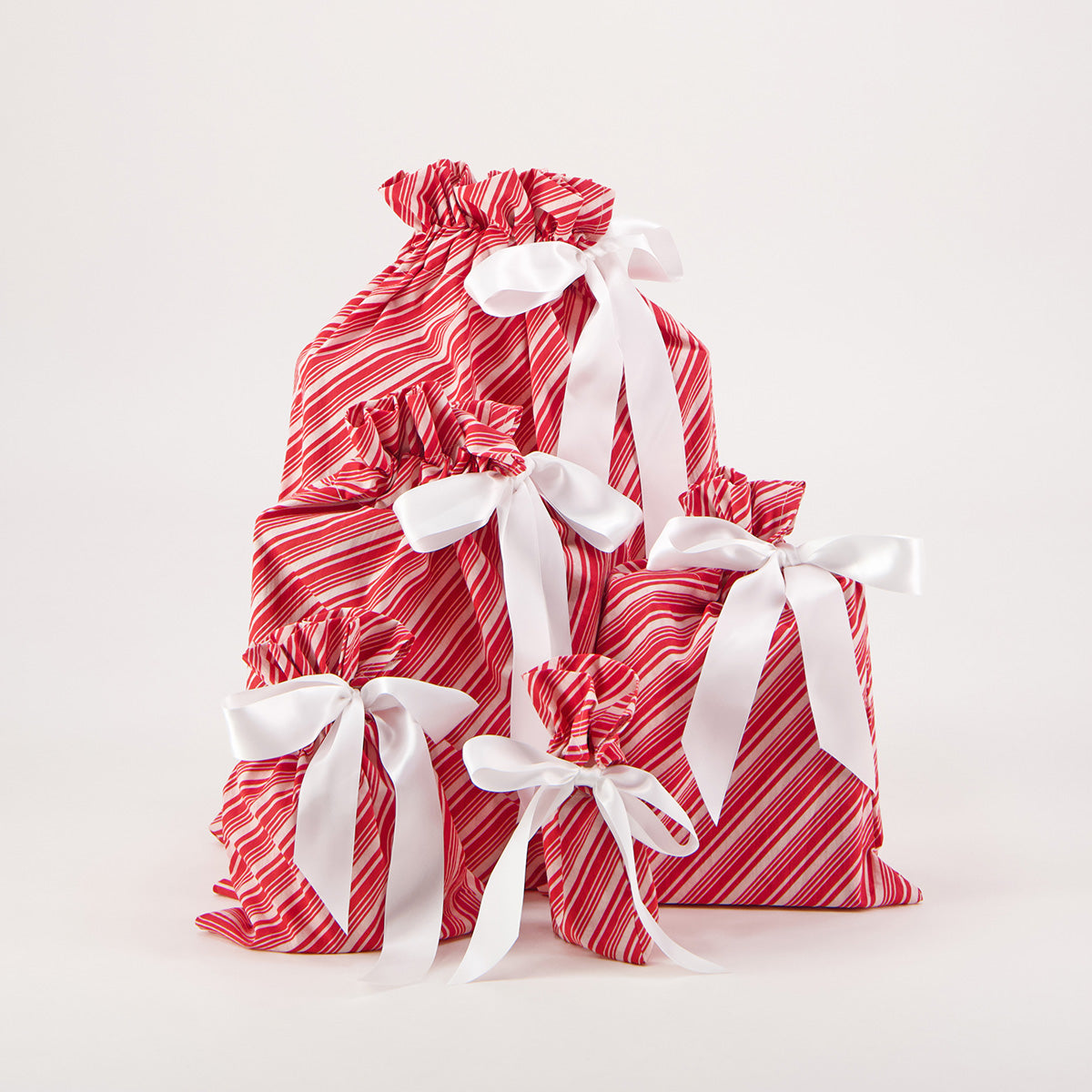 Candy Cane reusable gift bag set of 5 — classic red and white diagonal stripe — handmade in Afghanistan
