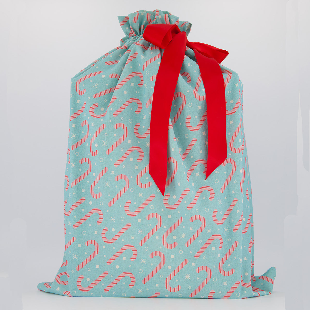 Santa Sack reusable gift bag — sweet candy-inspired print in pink, white and mint — handmade in Afghanistan