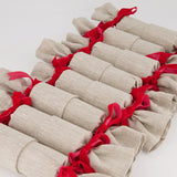 Luxury Linen and Velvet Re-Crackers (reusable eco-friendly Christmas Crackers or Bon bons). These crackers are made with 100% natural coloured flax linen and finished with red velvet ribbons.
