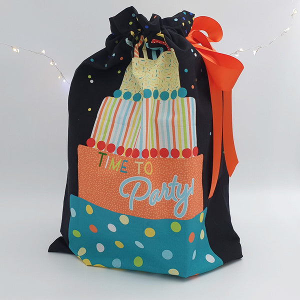 Large Time to Party reusable gift bag featuring a birthday cake and the words “Time to Party”.
