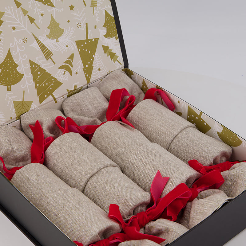 Boxed set of four Luxury Linen and Velvet Re-Crackers (reusable eco-friendly Christmas Crackers or Bon bons). These crackers are made with 100% natural coloured flax linen and finished with red velvet ribbons.